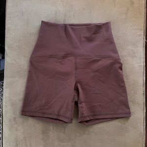 brown and black workout shorts
